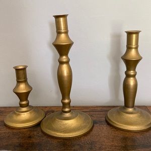 3 bronze candle holders
